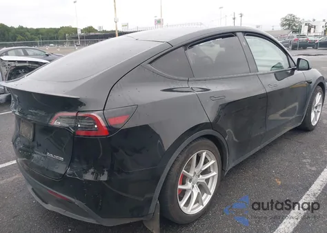 2023 Tesla Model Y Performance Dual Motor All-Wheel Drive z USA, uszkodzony, nr VIN 7SAYGDEF7PF980571